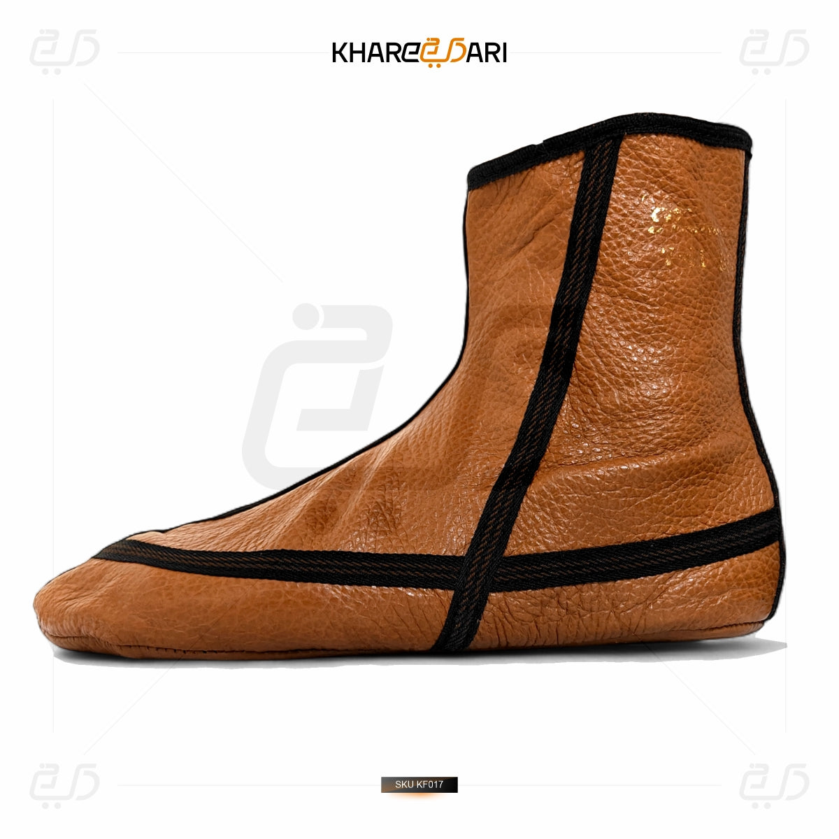 Brown leather shoe cover with black straps on a white background, branded 'Khareebari'. Brown