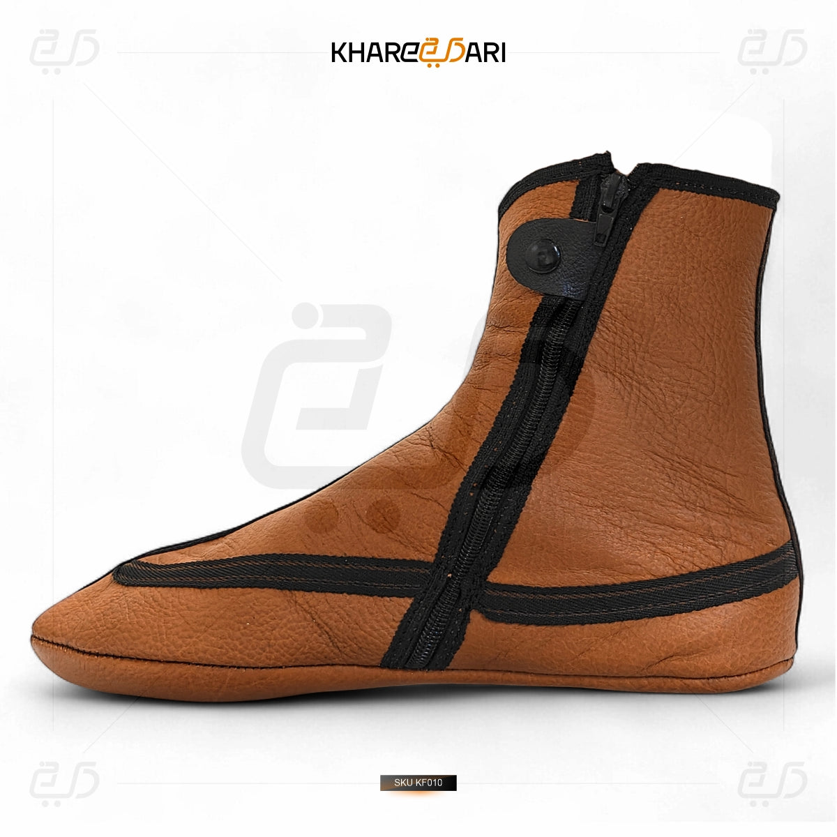 Brown leather shoe cover with black zipper on a white background, branded 'Khareebari'. Brown