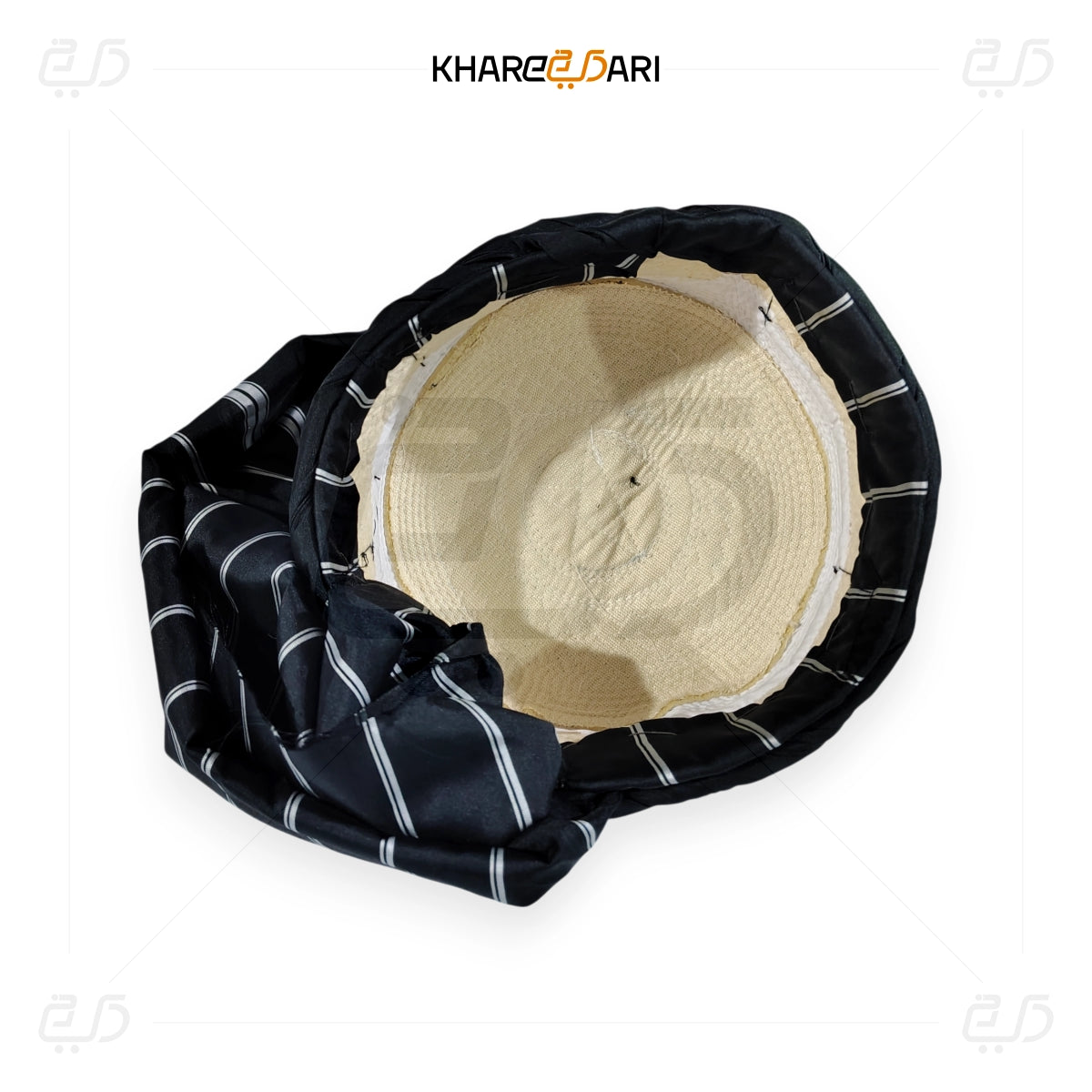 Black and white striped fabric wrapped around a beige circular object with 'Khareebari' branding. Black with White Line