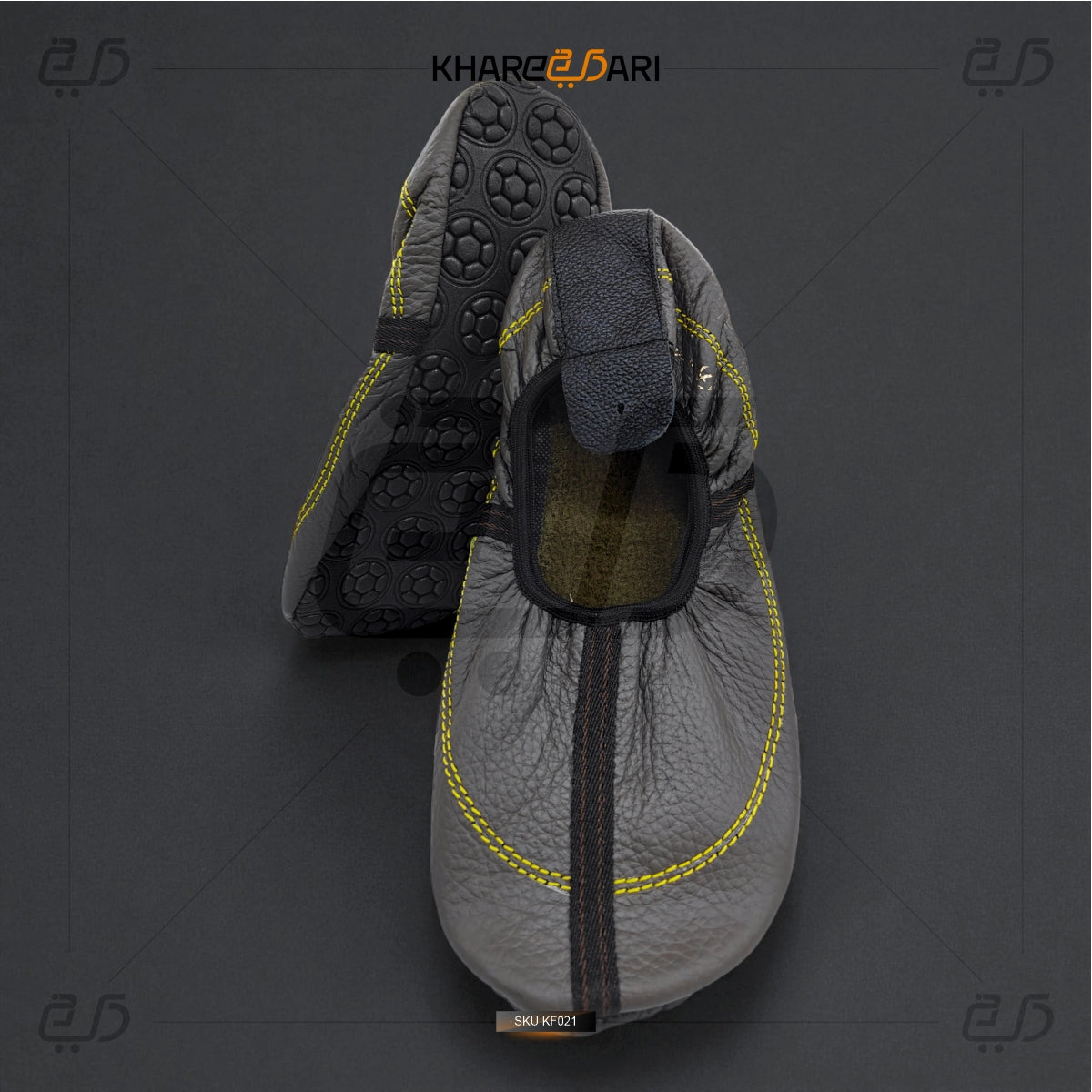 Gray slip-on shoes with yellow accents on a dark gray background, featuring the brand 'Khareeb Dari'. Grey