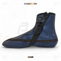 Blue shoe cover with black zipper on a white background, branded 'Khareebari'. Blue