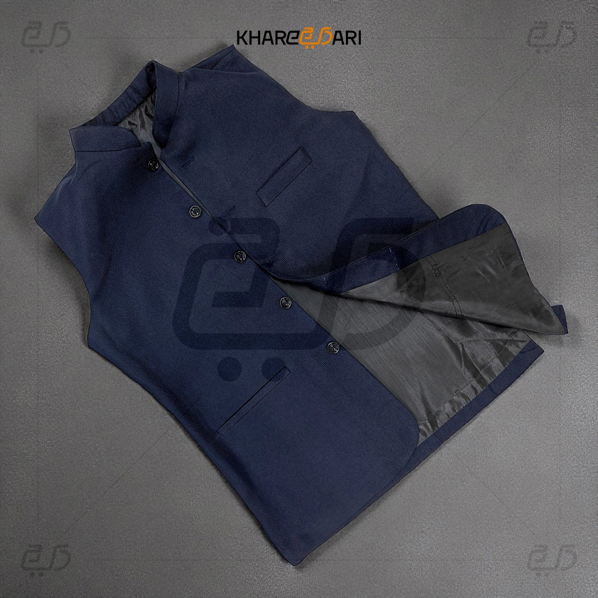 Blue coat with gray lining on a gray background, featuring the brand 'Khareeb Dari'. Blue